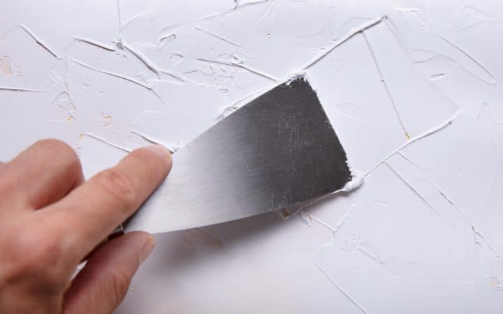 How to repair a dent in drywall without the fill shrinking back