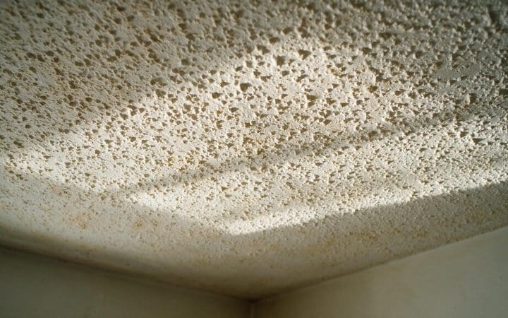 Popcorn ceiling asbestos: the years, the test, and what not to touch