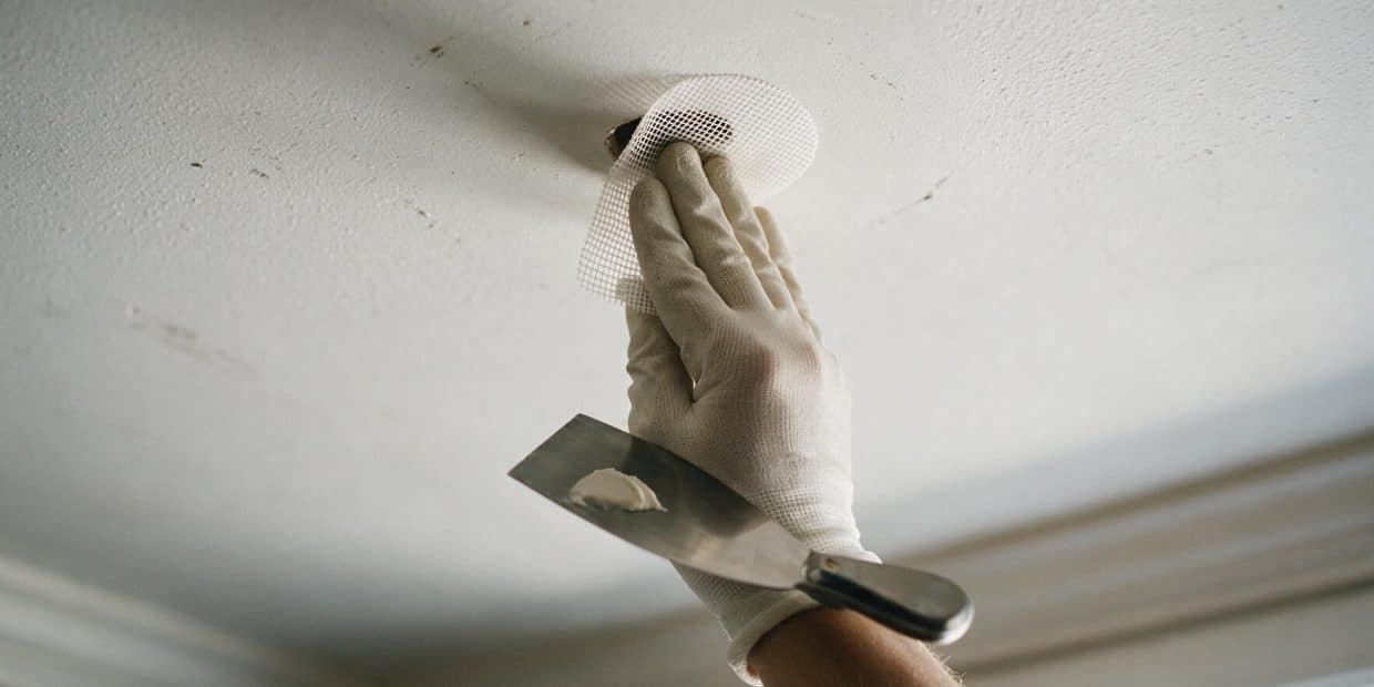 How to Patch a Small Hole in the Ceiling: What Changes When It’s Overhead