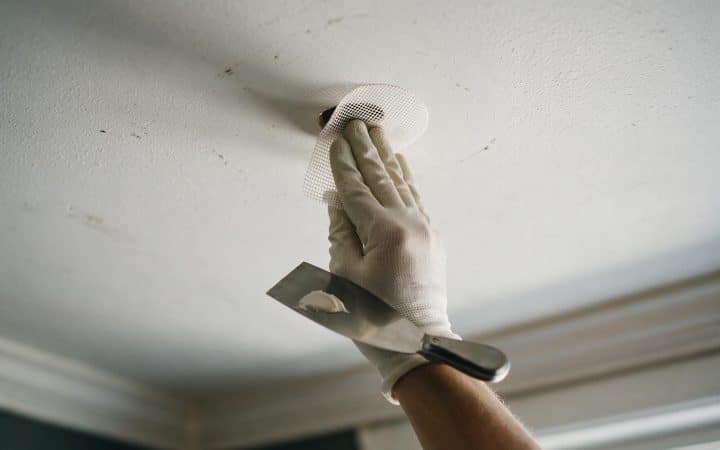 How to Patch a Small Hole in the Ceiling: What Changes When It’s Overhead
